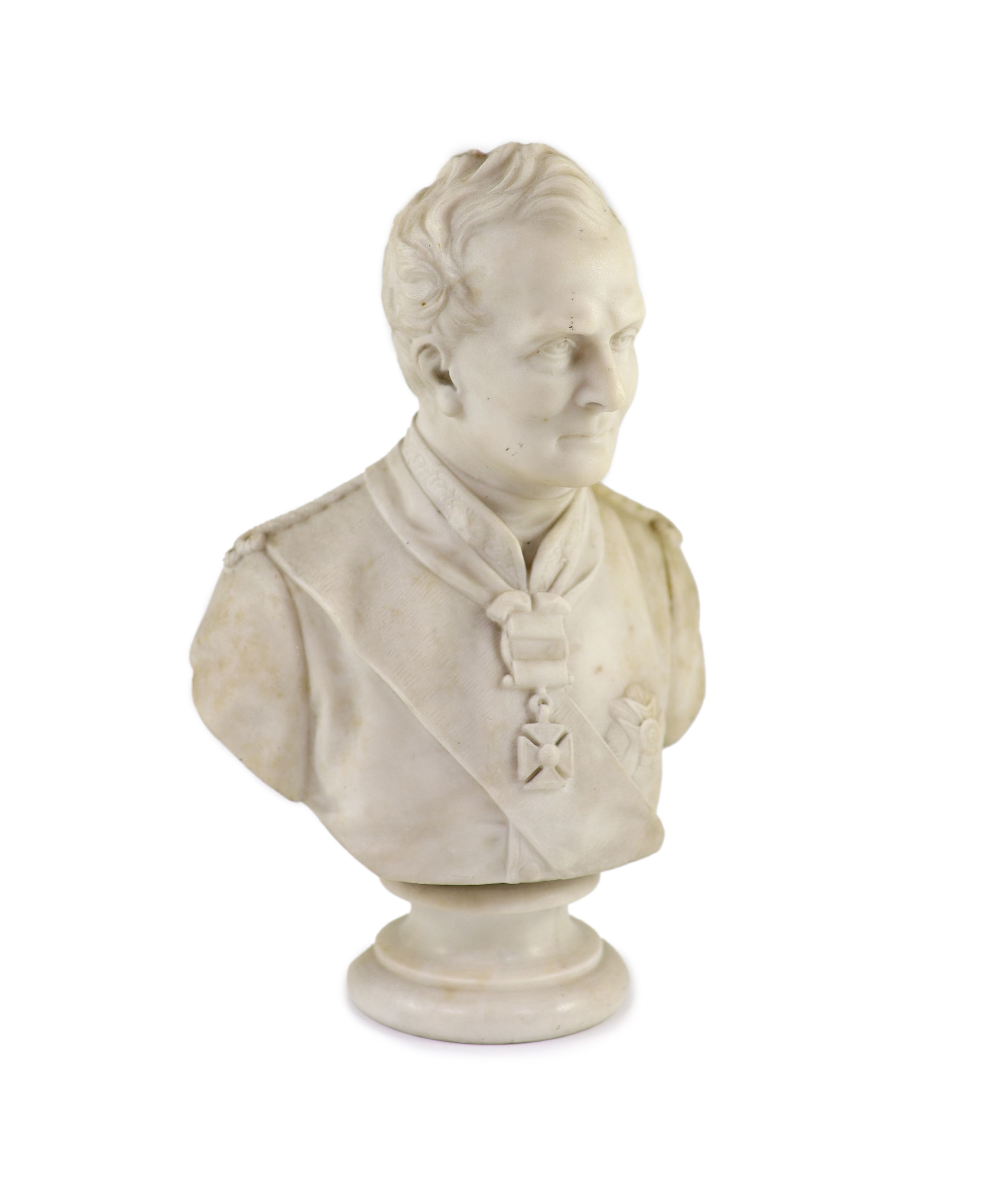 A mid 19th century marble bust of a British Peninsular War army officer wearing the Army Gold Cross and Garter Star, 34cm high